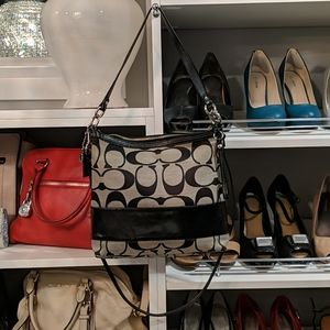 Black and Grey Coach shoulder or crossbody bag.